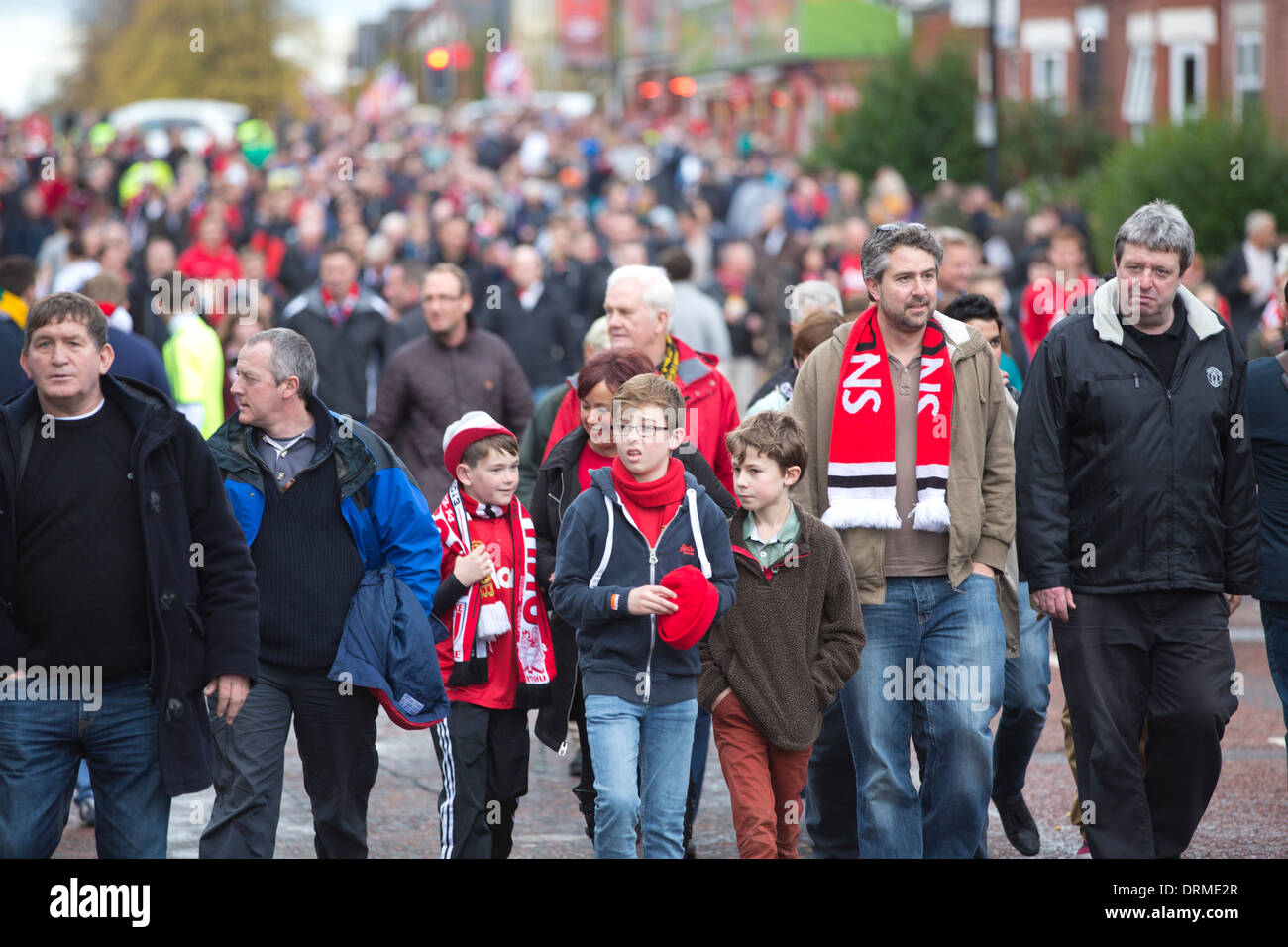 Football fans at Old Trafford in Stretford, the home of Machester United Football Club, Manchester, North England, UK Stock Photo