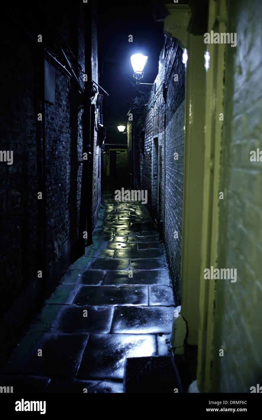 Dark alley at night in York Stock Photo