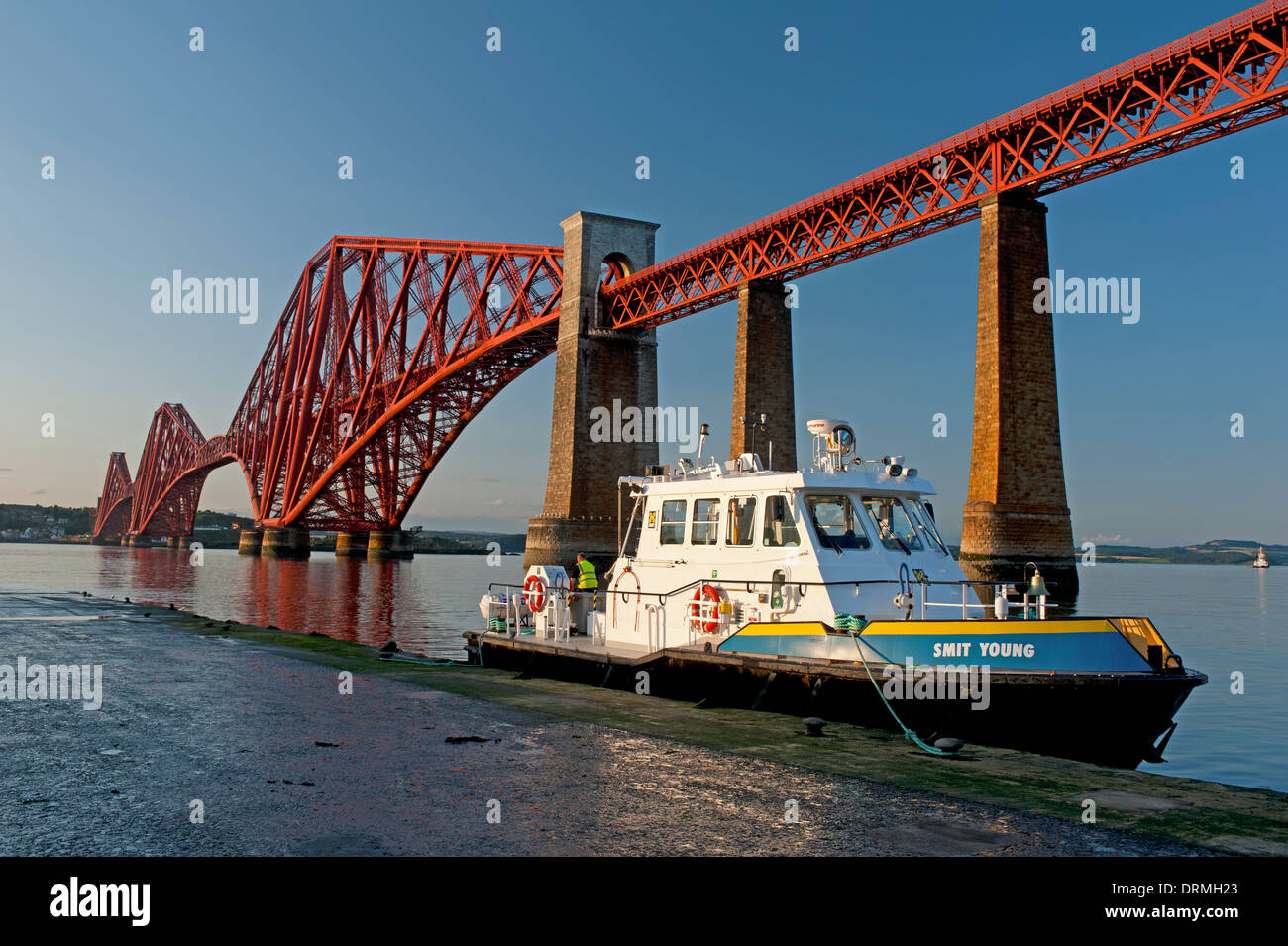 Impressive 361 feet high granite stone towers on the Firth of Forth supporting the Forth Rail Bridge.  SCO 9296. Stock Photo