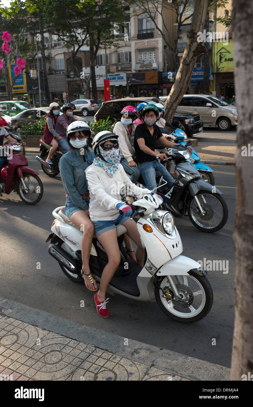 Young Vietnamese Girls Riding Scooter Downtown Ho Chi Minh City Stock Photo  - Alamy