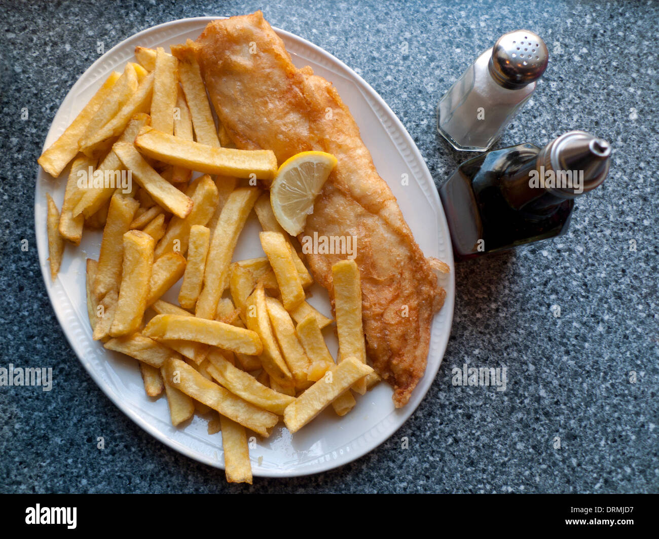 A view above fish & chips meal on a plate in award winning Lloyds fish and chip shop restaurant in Lampeter Ceredigion Wales UK   KATHY DEWITT Stock Photo