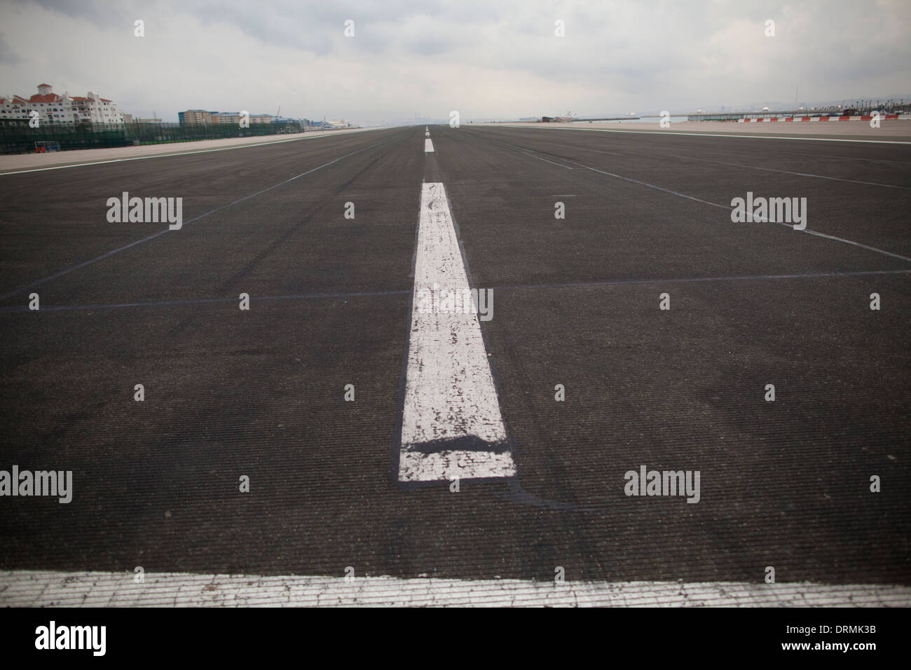 The main runway on Gibraltar which divides the UK territory and La Linea de la Concepcion, Spain Stock Photo
