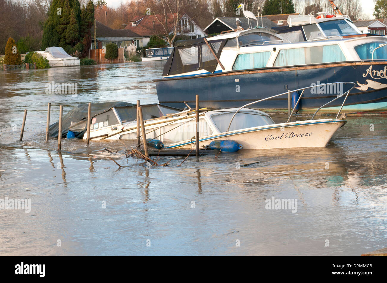 Sinking boat during the flooding of river Thames in WaltononThames