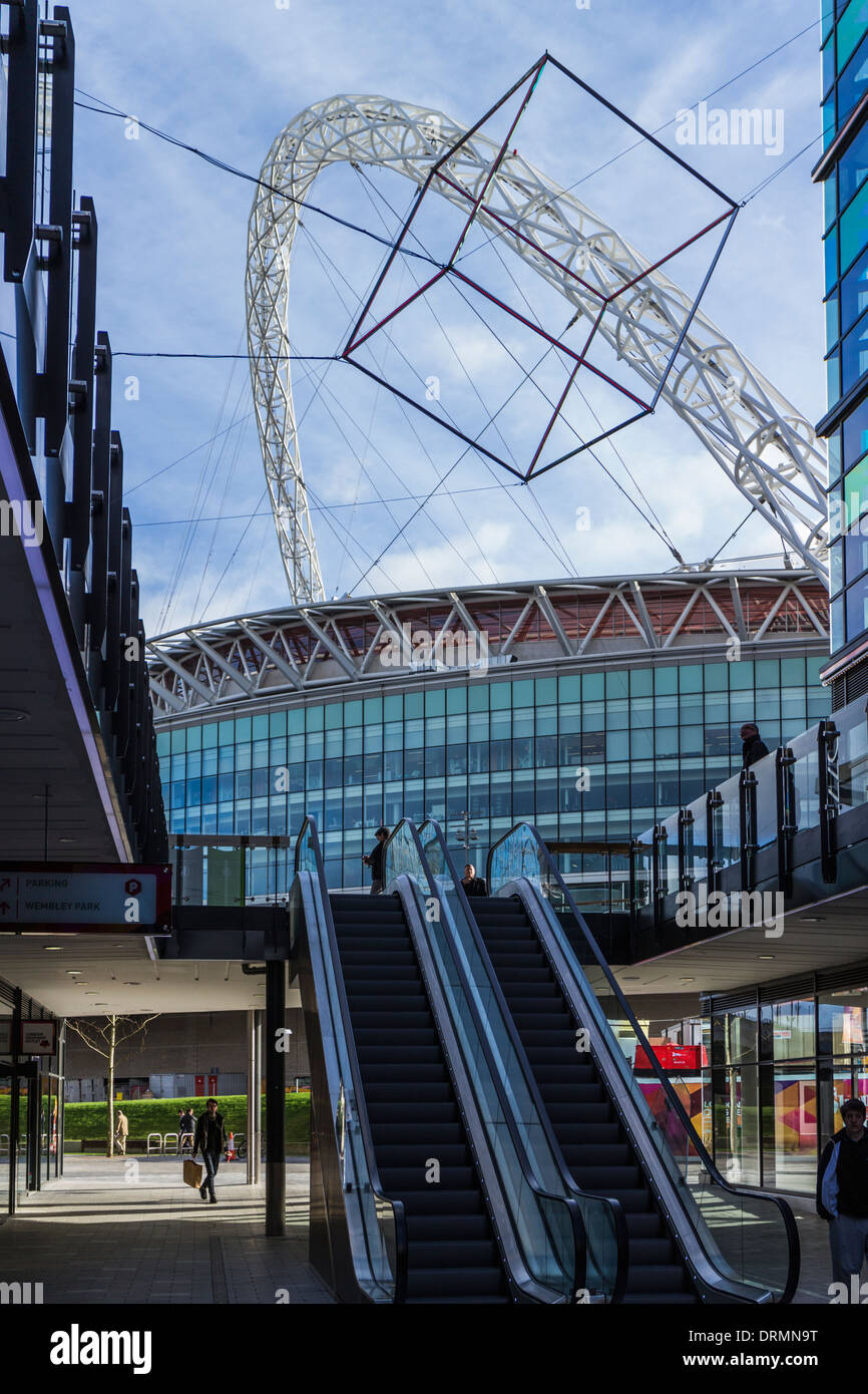 Wembley stadium arch viewed through the London Designer outlet building