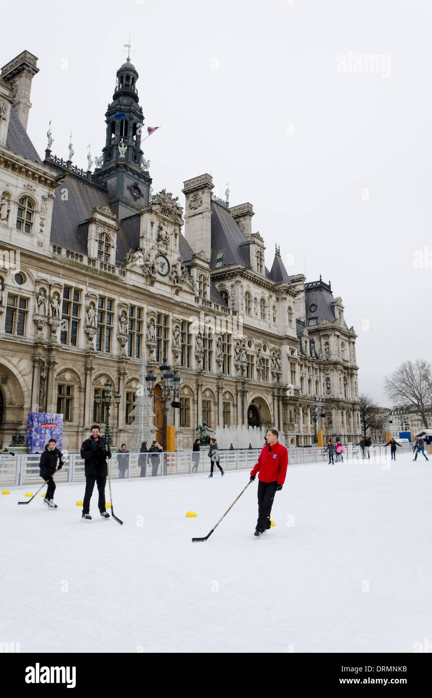 Hotel de Ville in winter, with seasonal ice skating rink in Paris