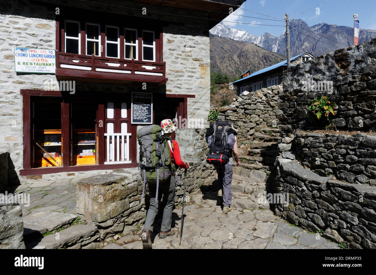 Two trekkers in a Nepal village on the Everest Base Camp trek Stock Photo