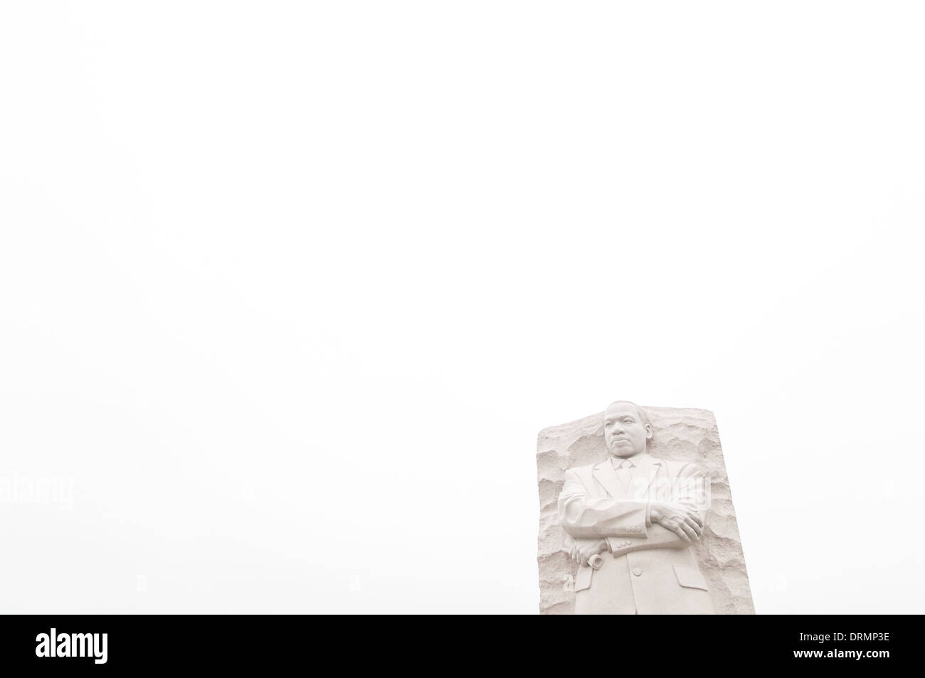 WASHINGTON DC, USA - Dedicated on October 16, 2011, the MLK Memorial commemorates Civil Rights leader Dr. Martin Luther King Jr. It falls on a direct line between the Lincoln Memorial and the Jefferson Memorial and situated on the banks of the Tidal Basin. The centerpiece is a stone statue sculpted by Lei Yixin on which the figure of Dr. King emerges from a block of stone called the Stone of Hope. Each spring the cherry blossoms on the tidal basin burst into bloom. Stock Photo