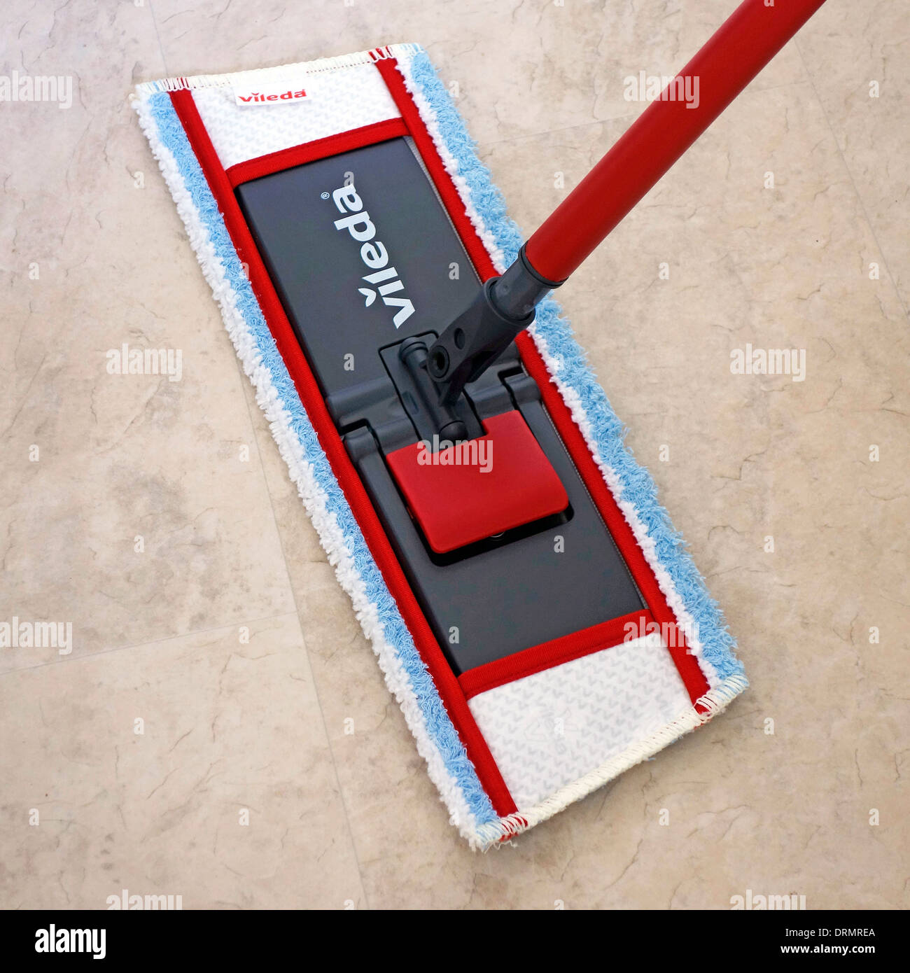 Vileda Mop Mopping a Marble Effect Vinyl Floor Stock Photo Alamy