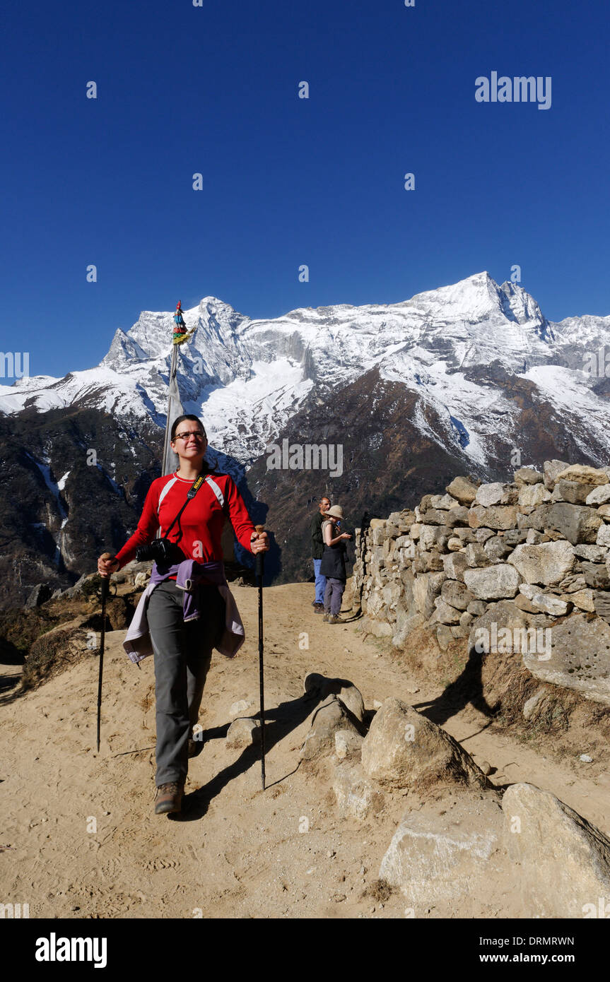 A lady trekker on the Everest base camp trek Stock Photo