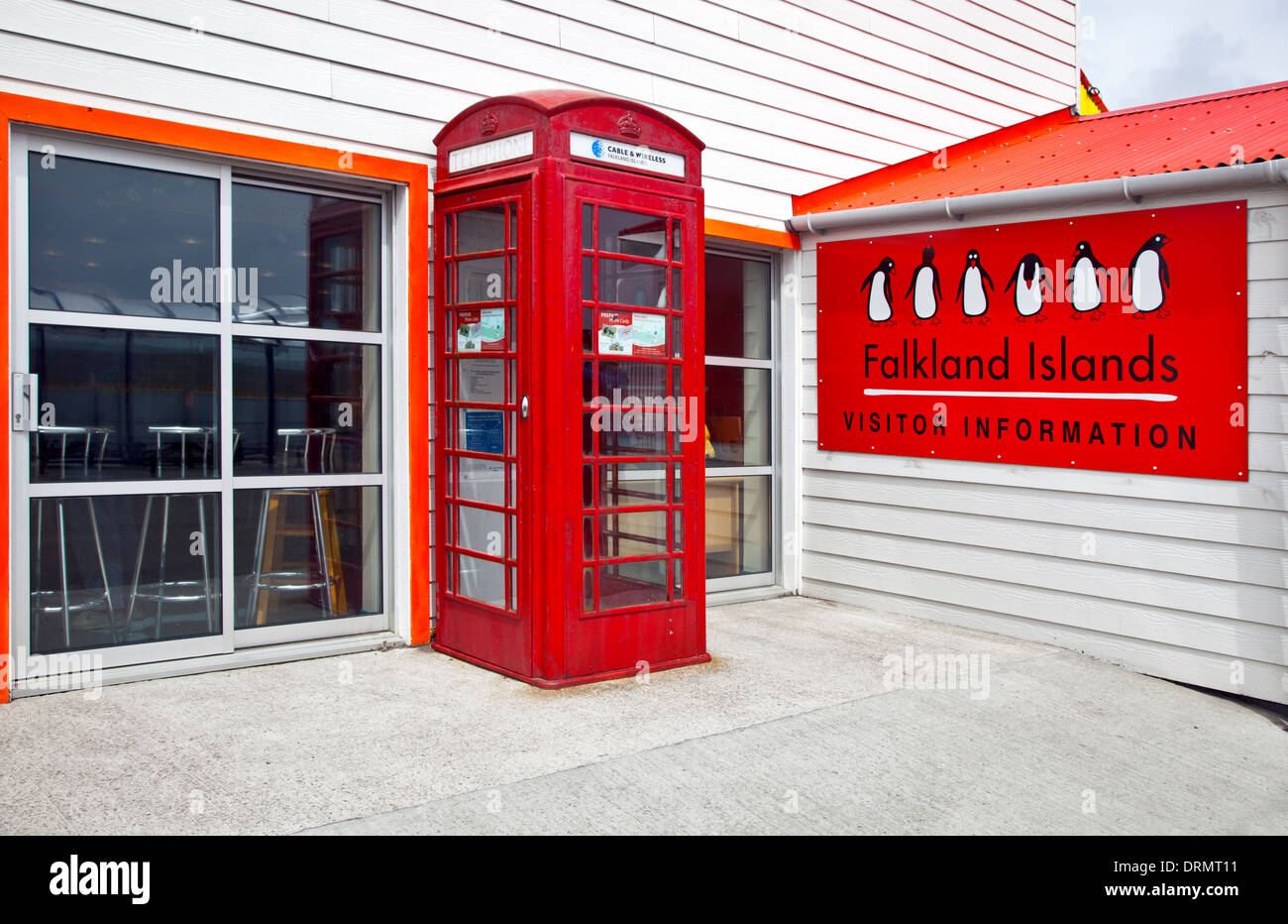Traditional Red British Telephone Kiosk at the Visitor Information Centre, Stanley, Falkland Islands Stock Photo