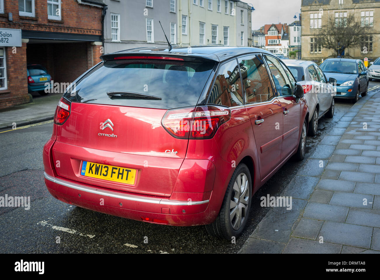 CITROEN PICASSO C4 saloon car parked at roadside in town Stock Photo