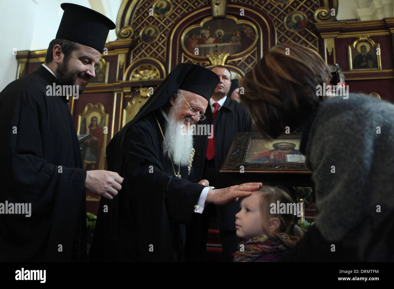 Patriarch Bartholomew I of Constantinople blesses to a young girl during his visit to Prague, Czech Republic. Stock Photo