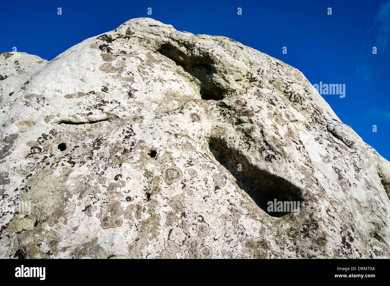 Upper part of a large stone in the Avebury circle showing lichen stain and 'foot-holds' Stock Photo