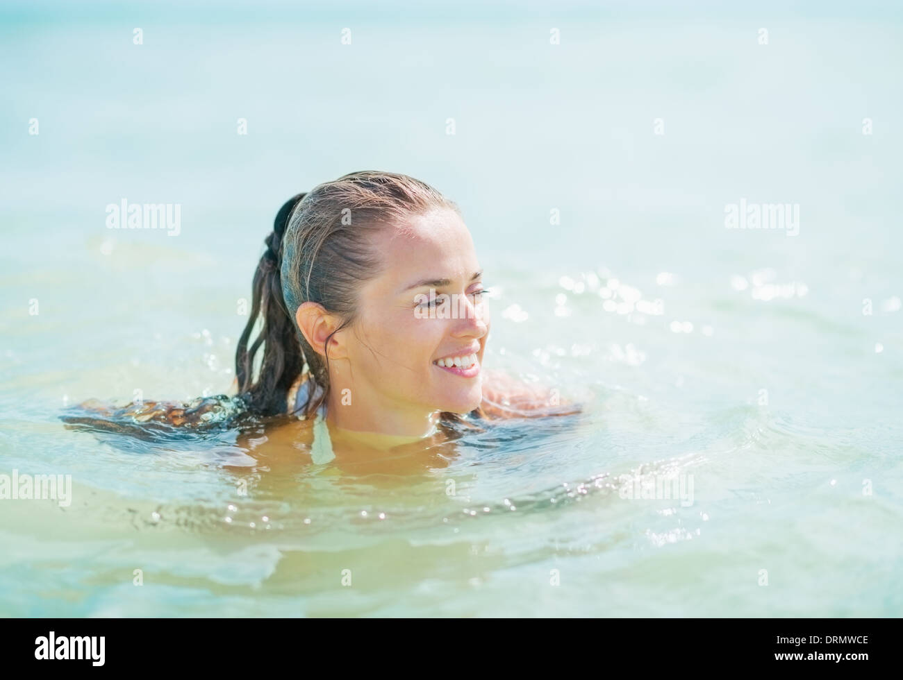 Woman swimming in sea hi-res stock photography and images - Alamy