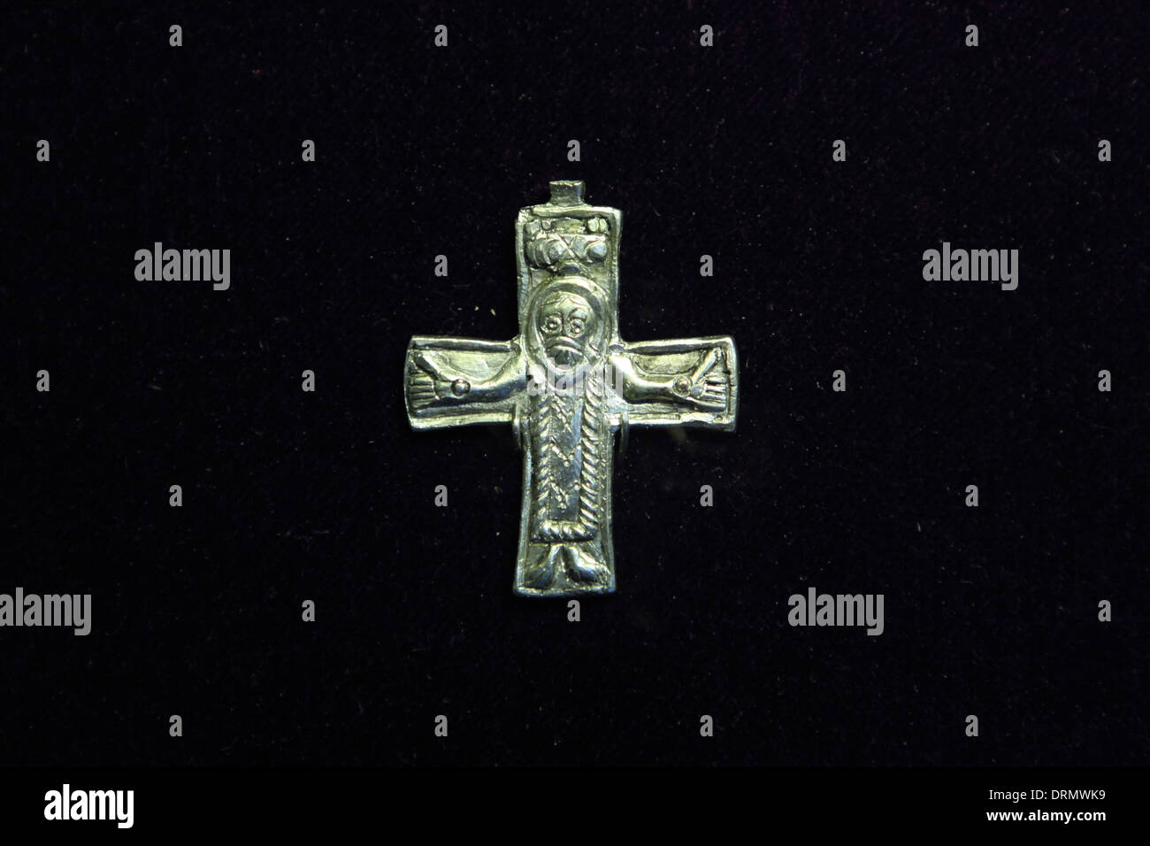 Great Moravian Empire. Silver cross with the image of the crucified Christ from the 9th century, found in Mikulcice. Stock Photo