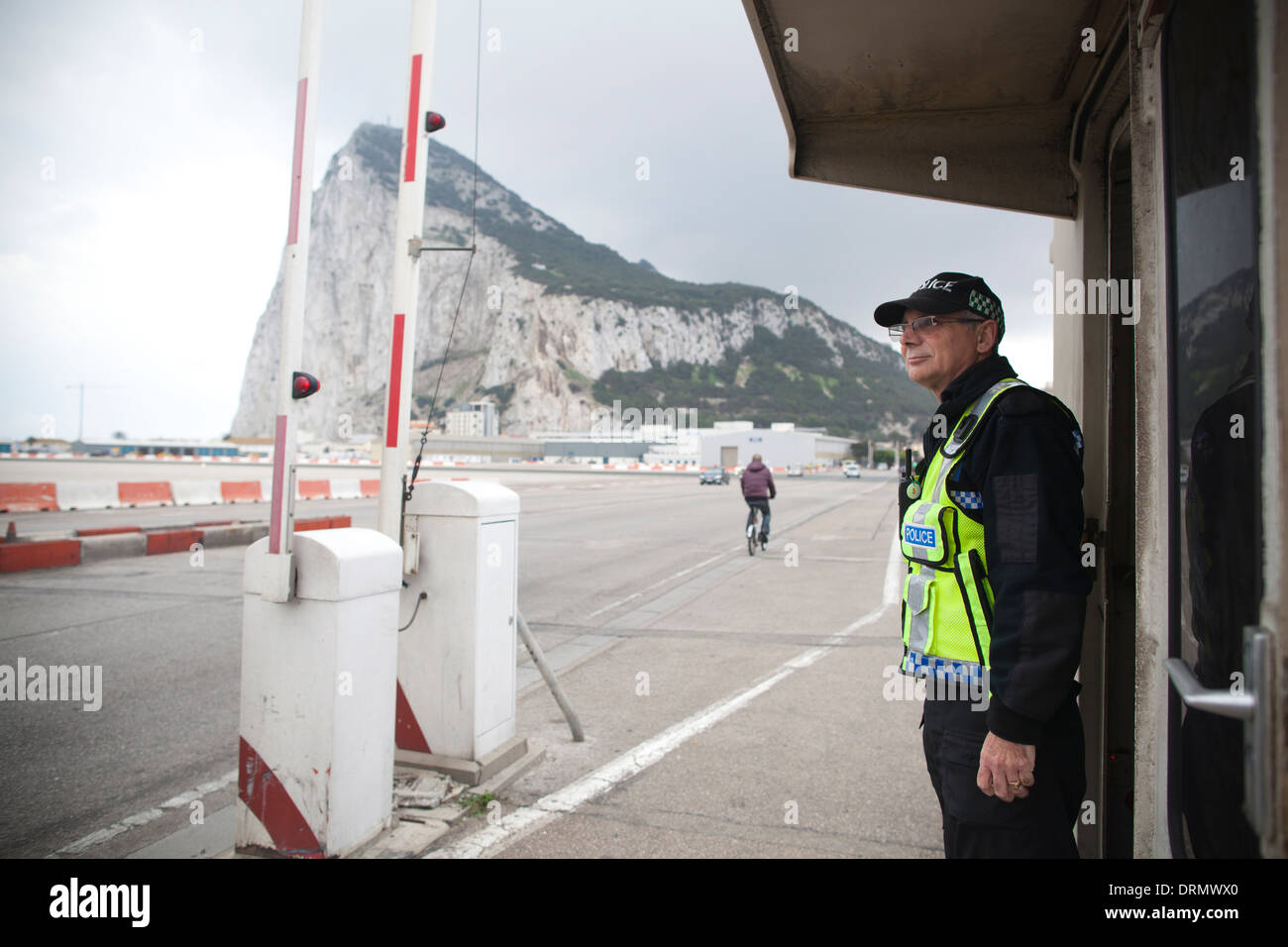 British border Police guard the border crossing between La Linea in Spain and Gibraltar part of United Kingdom Oversea Territory Stock Photo