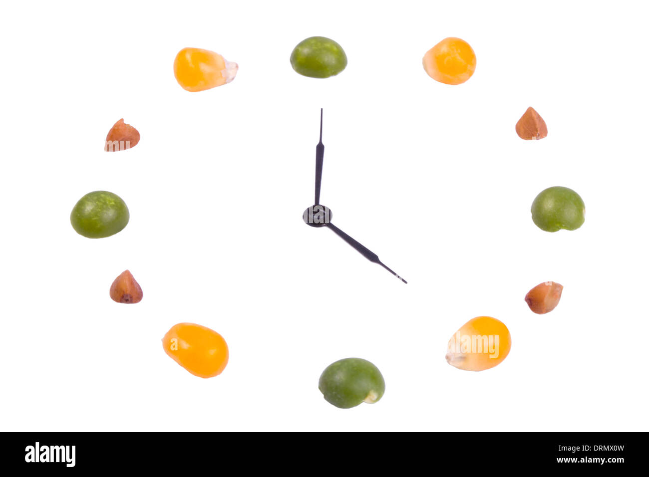 Fruit in the form of hours on a white background isolated Stock Photo