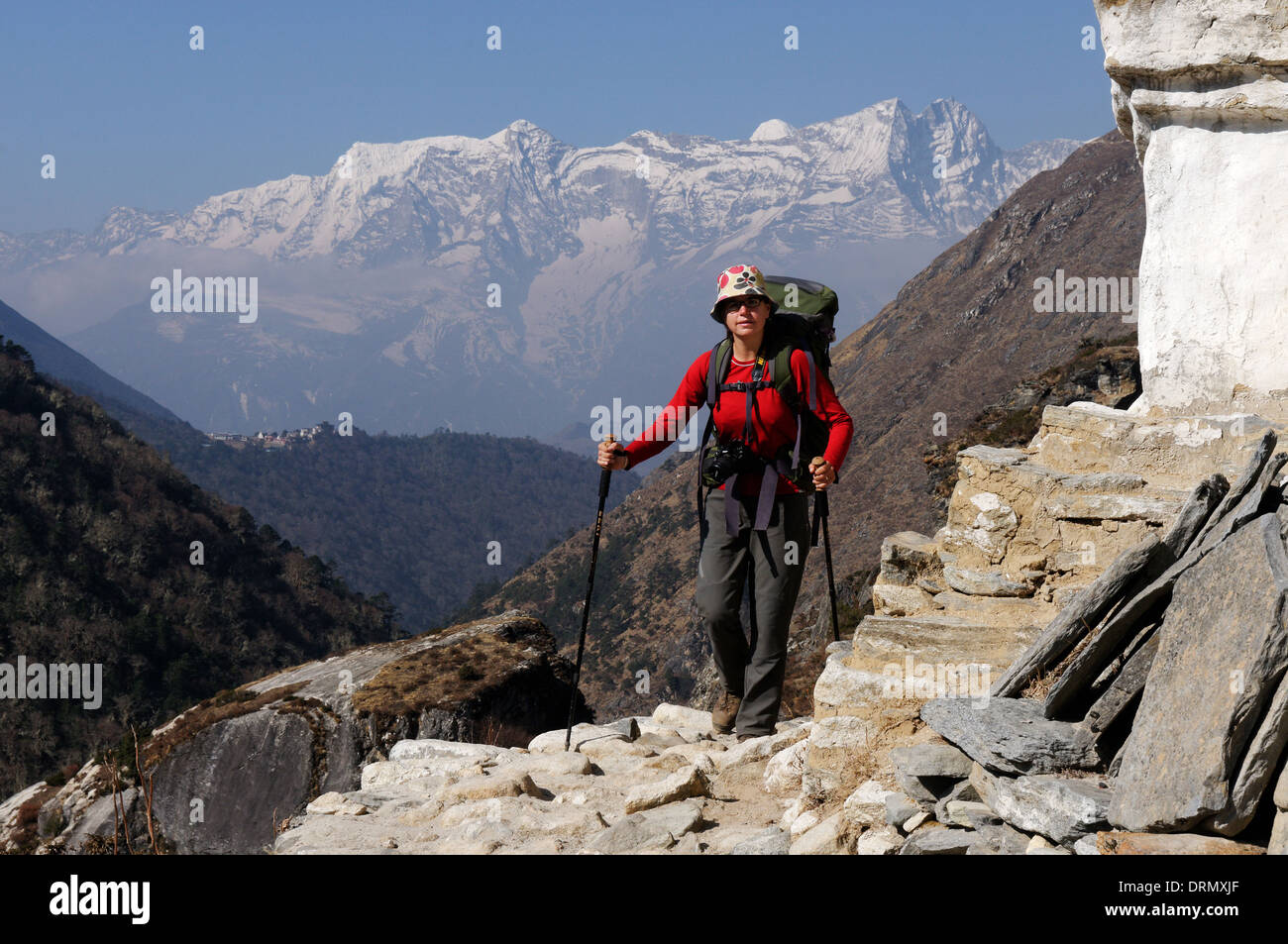 A lady trekker on the Everest Base Camp trek Stock Photo