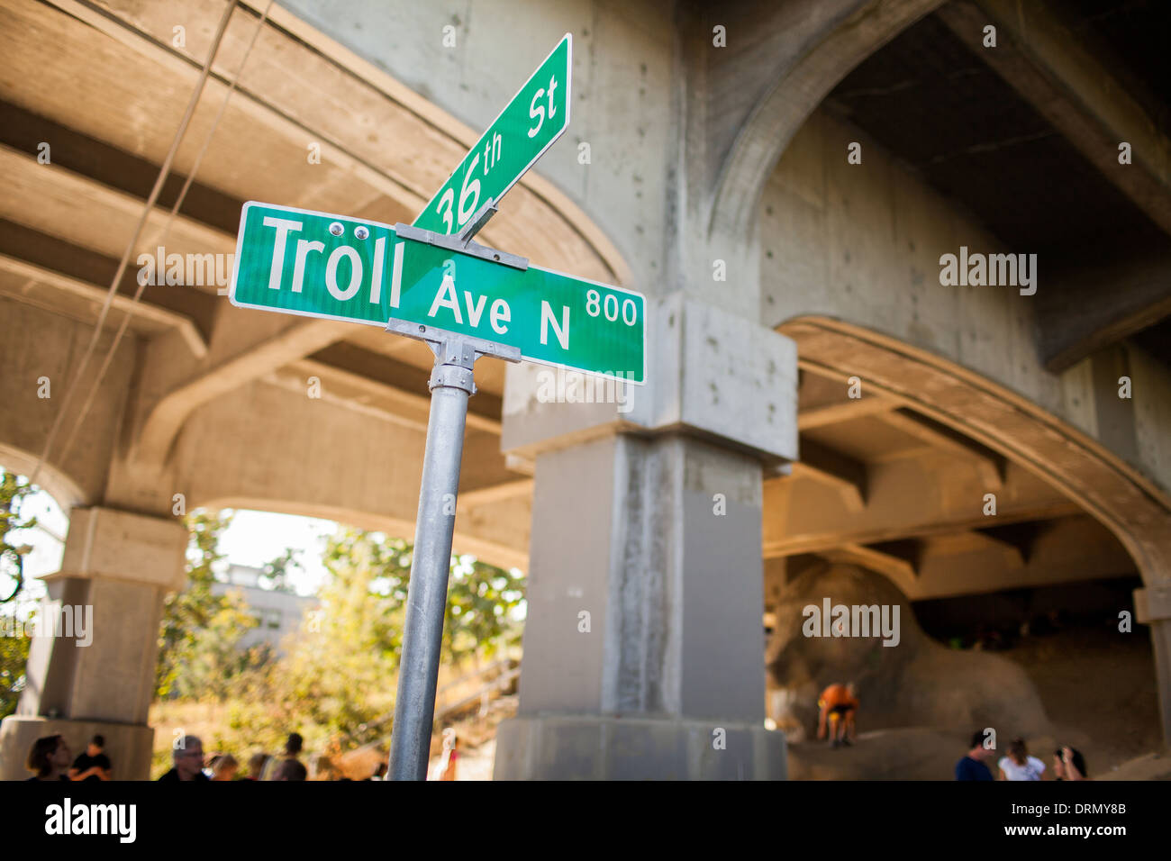 Photograph of Street Sign by the Freemont Troll in of Seattle, Troll Ave. Stock Photo