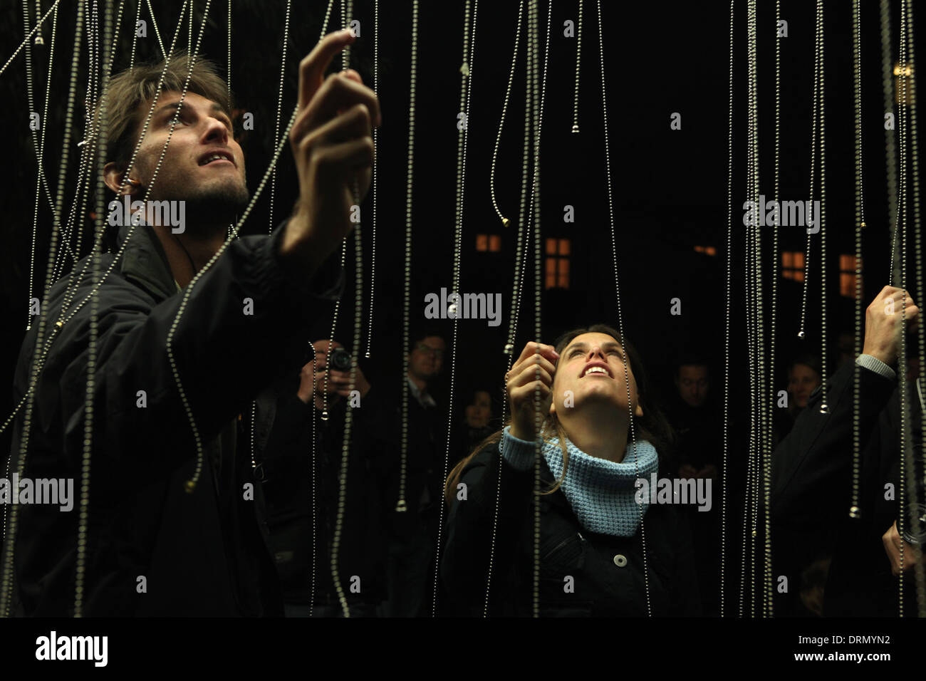 People switch lights on and off on an interactive sculpture The Cloud during the Signal Festival in Prague, Czech Republic. Stock Photo