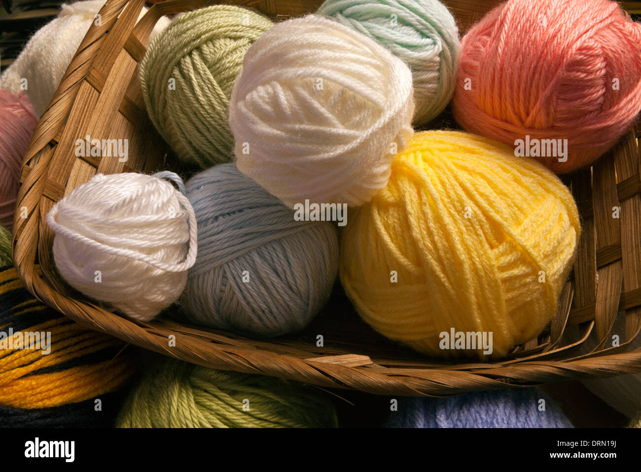 WASHINGTON - Balls of left over yarn in a basket. Stock Photo