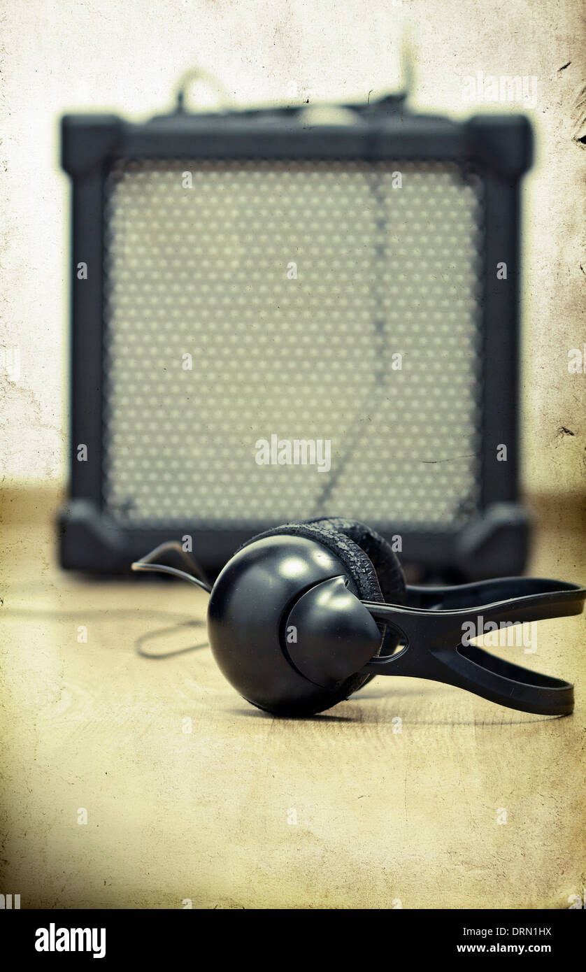 Headphones and guitar amplifier Stock Photo Alamy