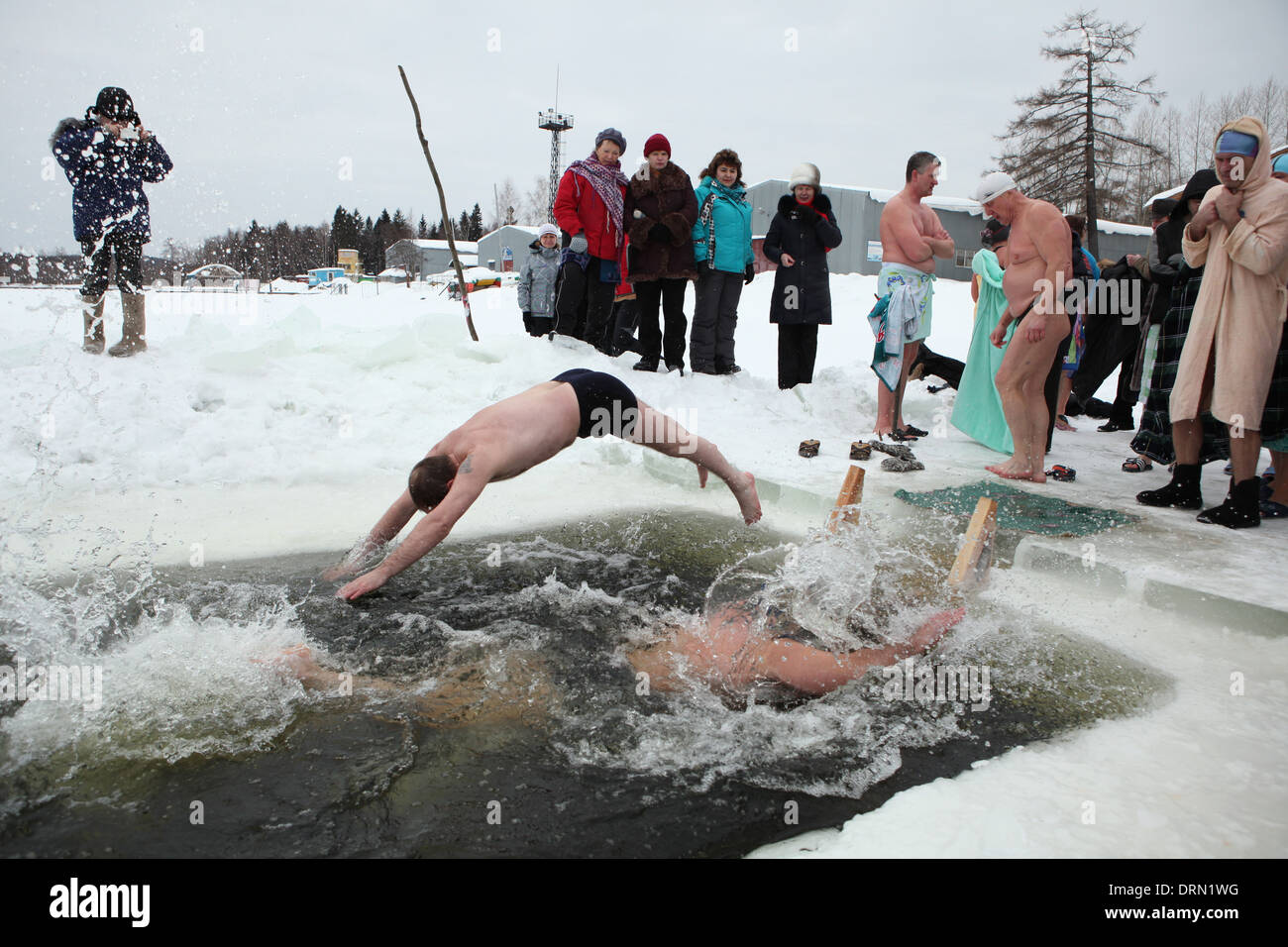 Competition in winter swimming in the Verkh-Neyvinsky Pond near the town of Novouralsk in the Urals Mountains, Russia. Stock Photo