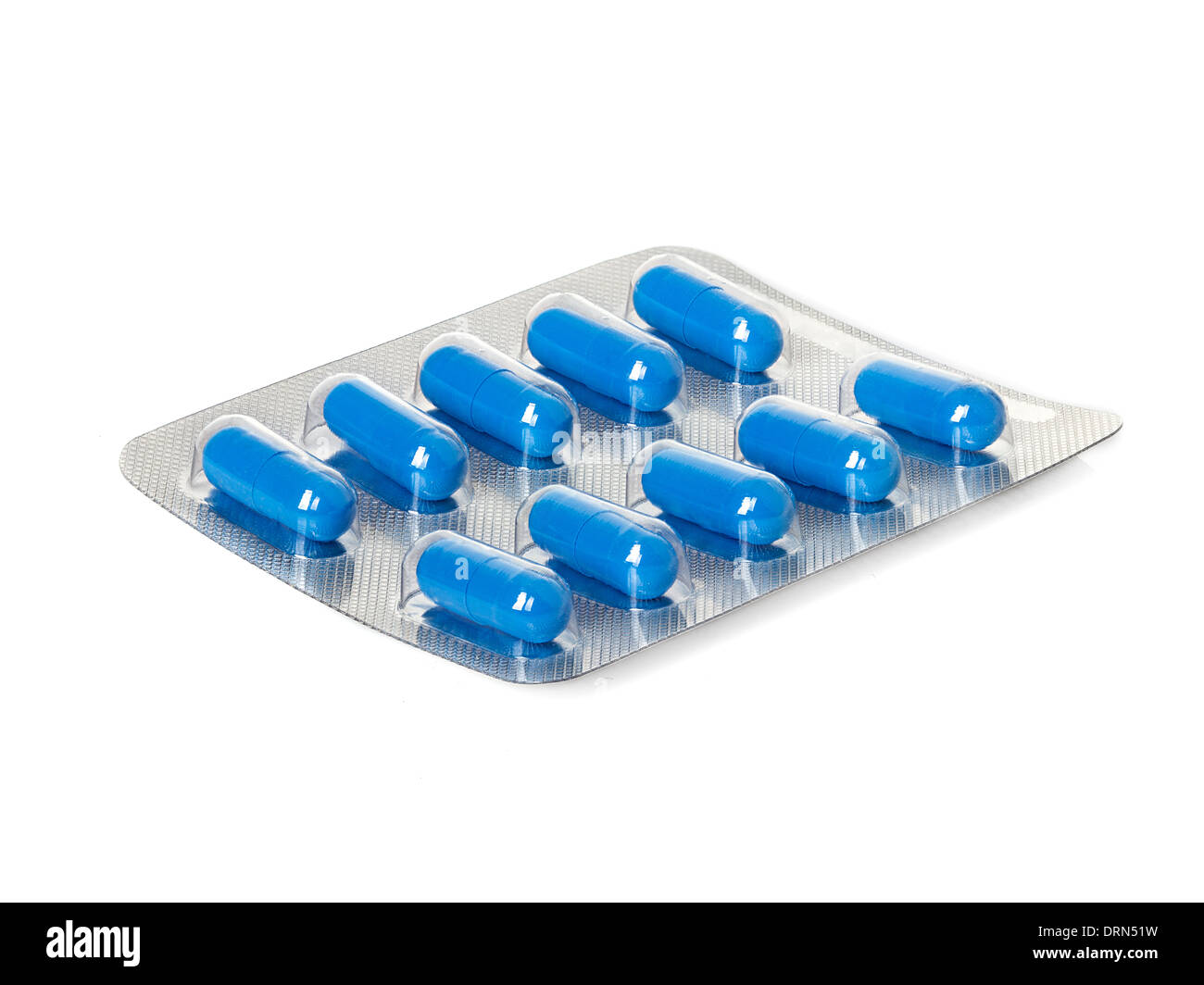 Blue medication capsules in blister pack close-up Stock Photo