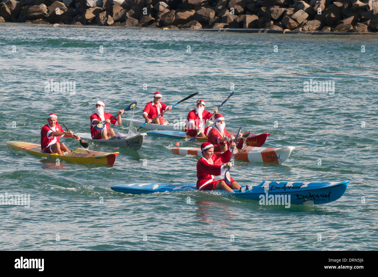 Kayakers celebrating Christmas Day on the Sunshine Coast, Queensland, Australia Stock Photo