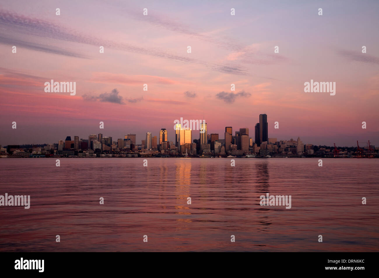 WASHINGTON - The Seattle skyline and Elliott Bay from West Seattle at dusk. Stock Photo