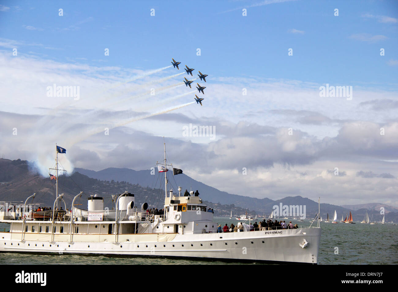 Blue Angels flying over the Presidential USS Potomac ship during fleet week, San Francisco, California, USA. Stock Photo
