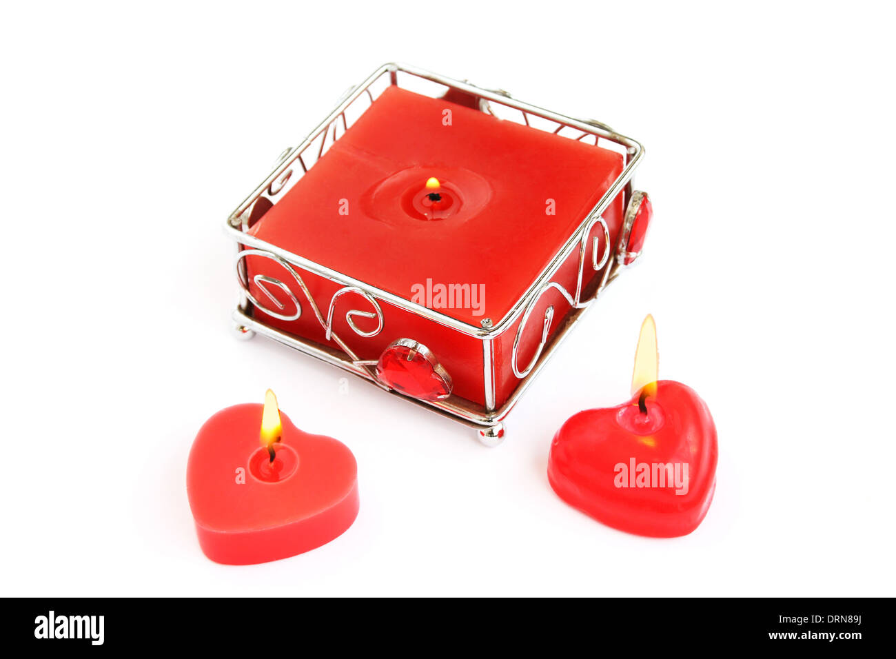 Red candles isolated on white background Stock Photo Alamy