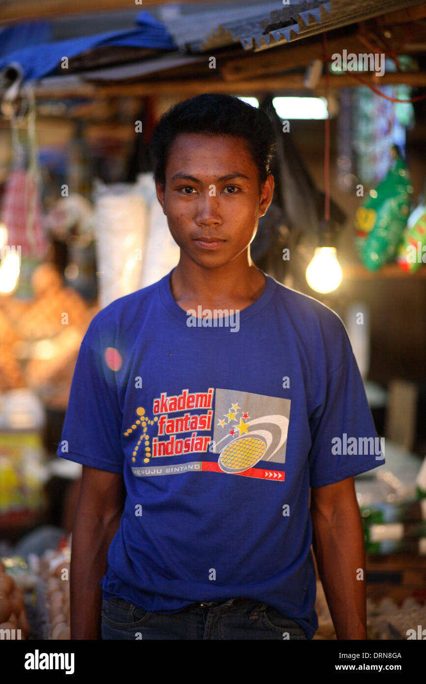 Portrait of smiling Indonesian young man at market in Kupang, West Timor, Indonesia Nov 2005 Stock Photo