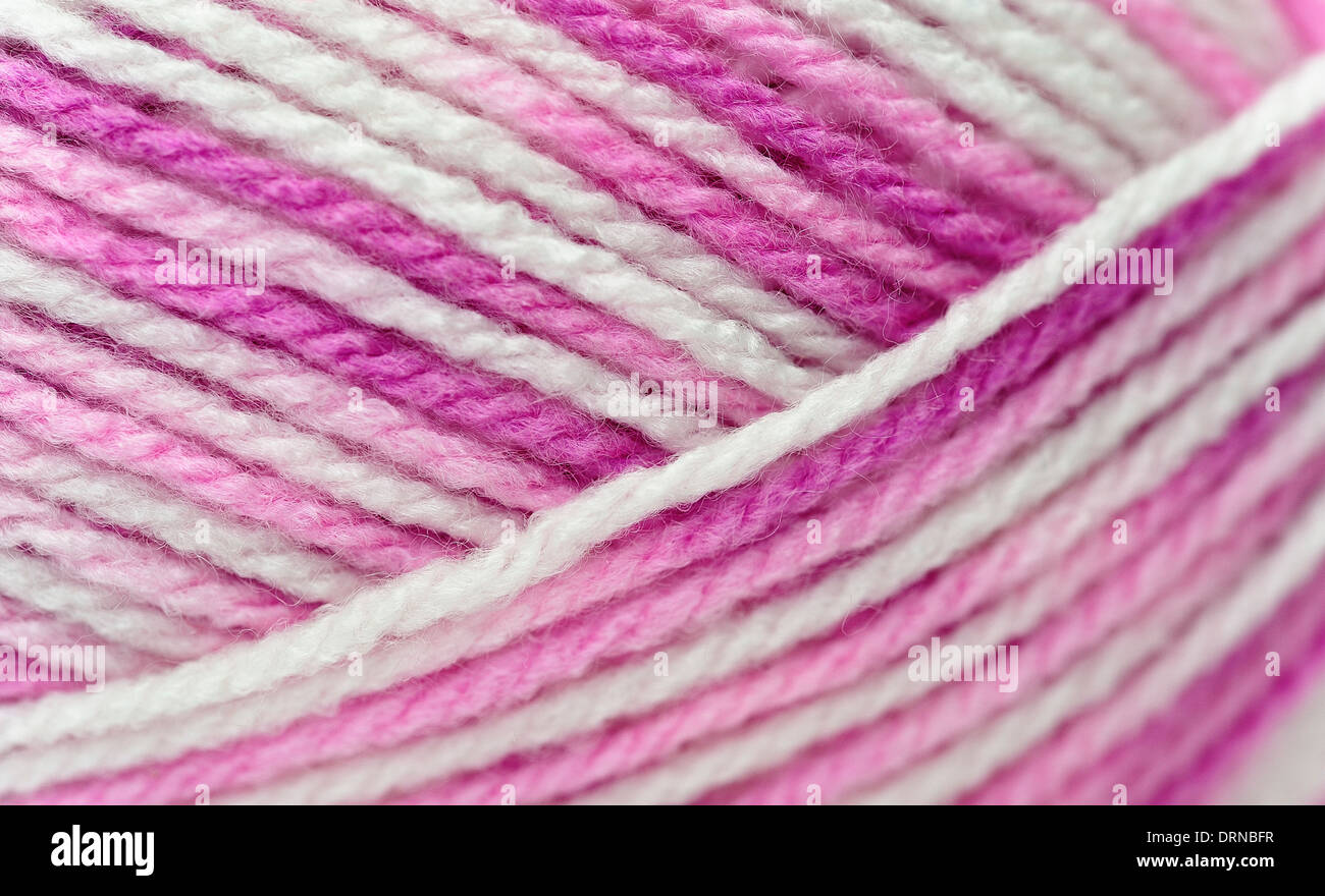 A ball of pink and white knitting wool Stock Photo