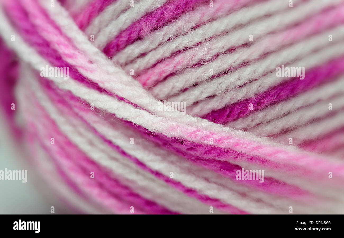 A ball of pink and white knitting wool Stock Photo