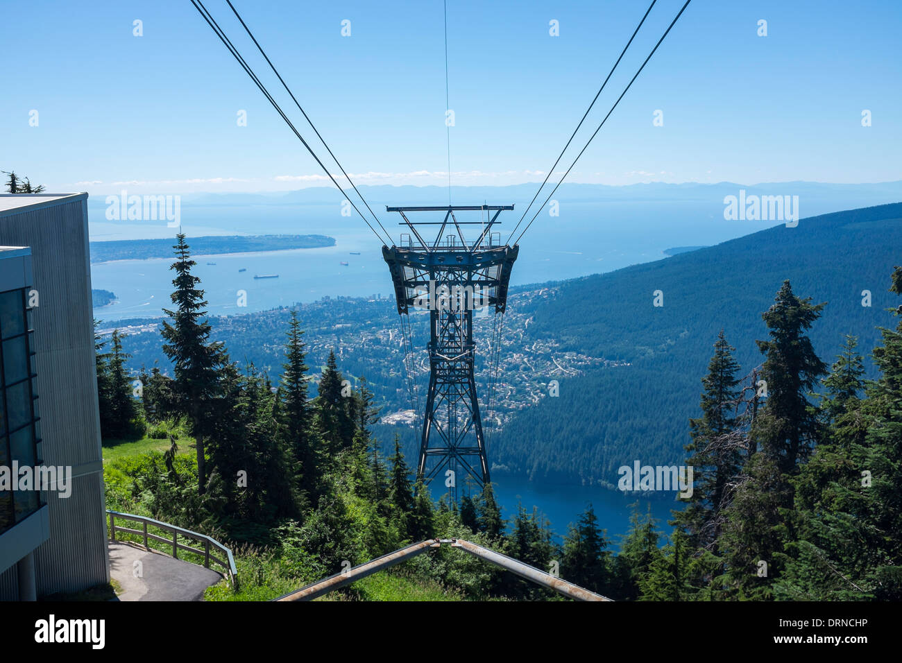 A cable car tower dominates the view of Vancouver Harbour from the top