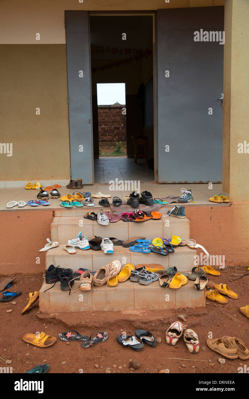 dusty shoes outside classroom of school in Bobo Dioulasso, Burkina Faso, Africa Stock Photo