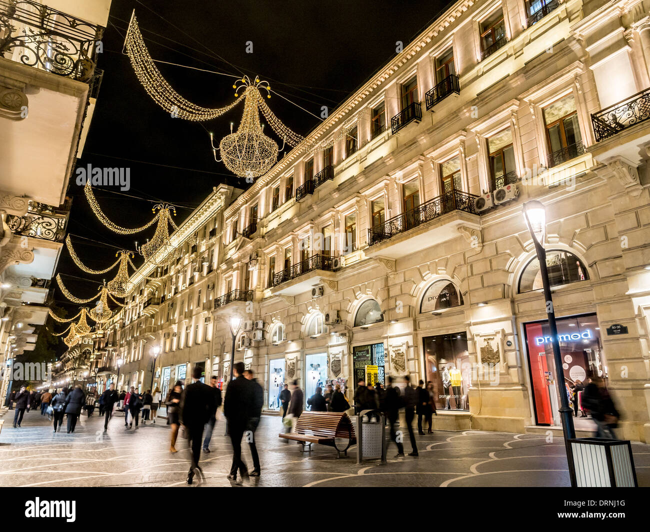 Nizami street in the center of Baku, Azarbaijan, illuminated by night. Stock Photo