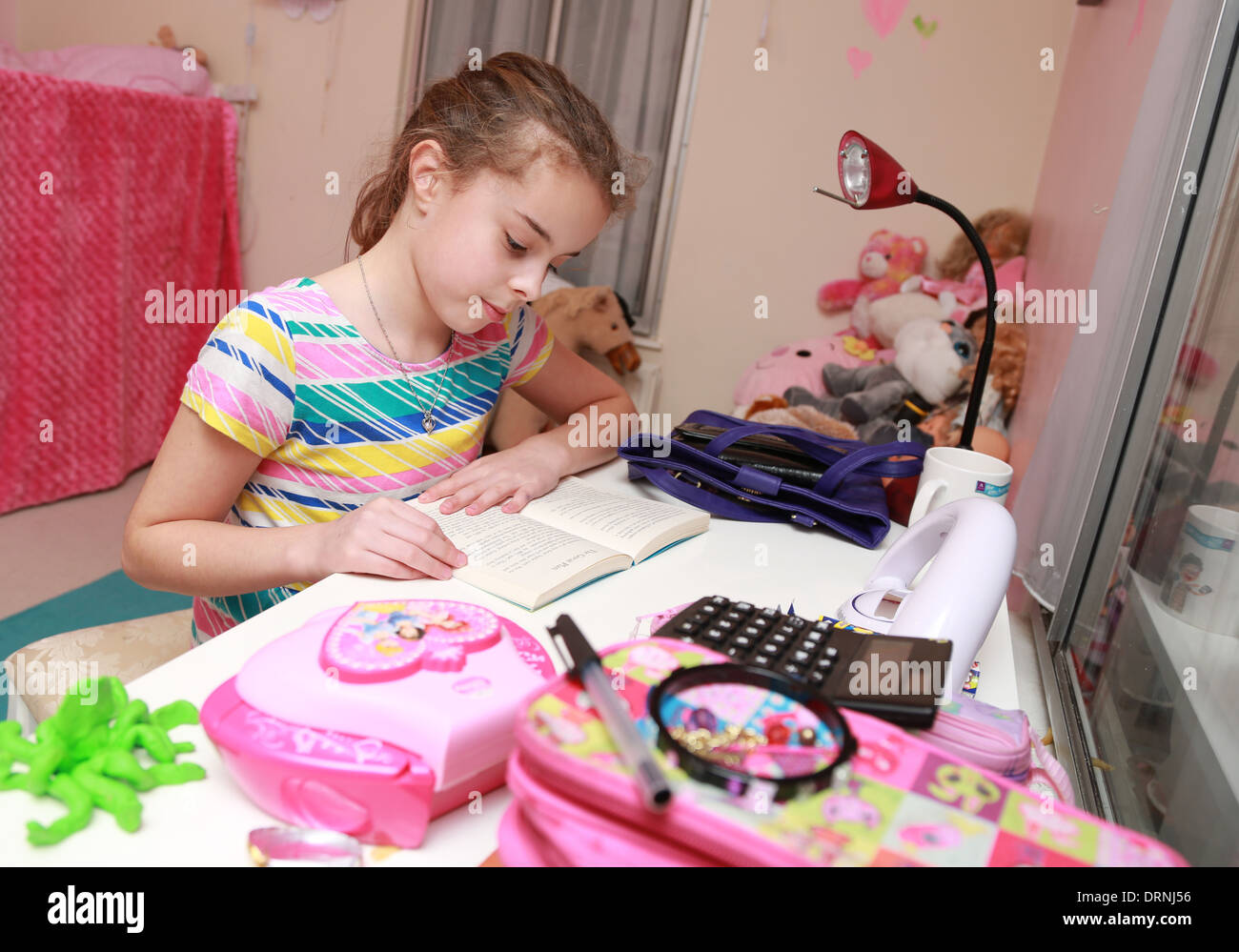 10 Year Old Girl Doing Her Homework Stock Photo Alamy 10-year-old-girl-doing-her-homework-stock-photo-alamy