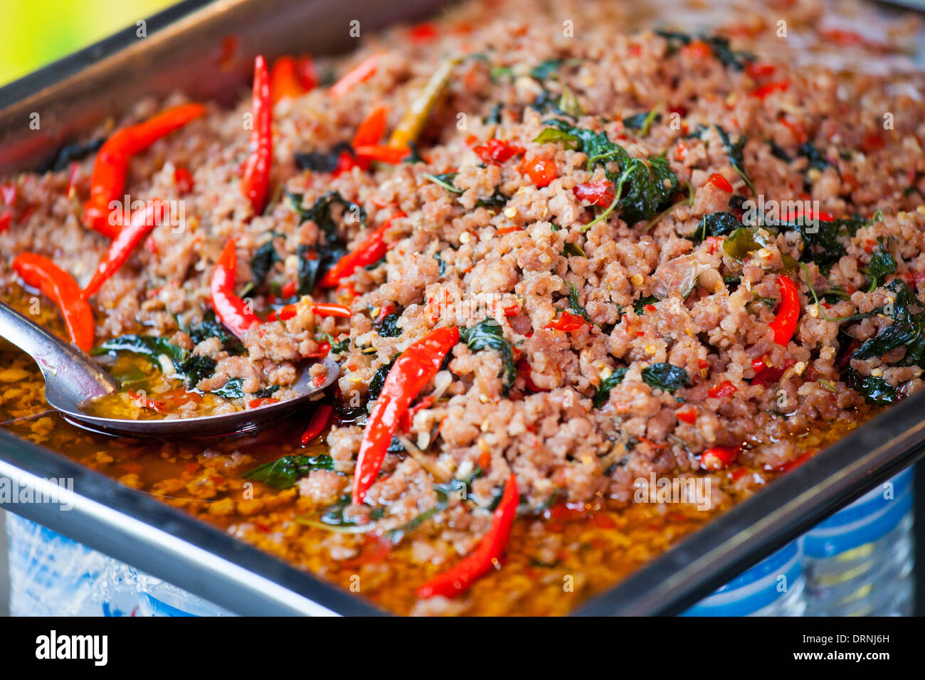 Thai food at a street vendor in Bangkok, Thailand Stock Photo - Alamy