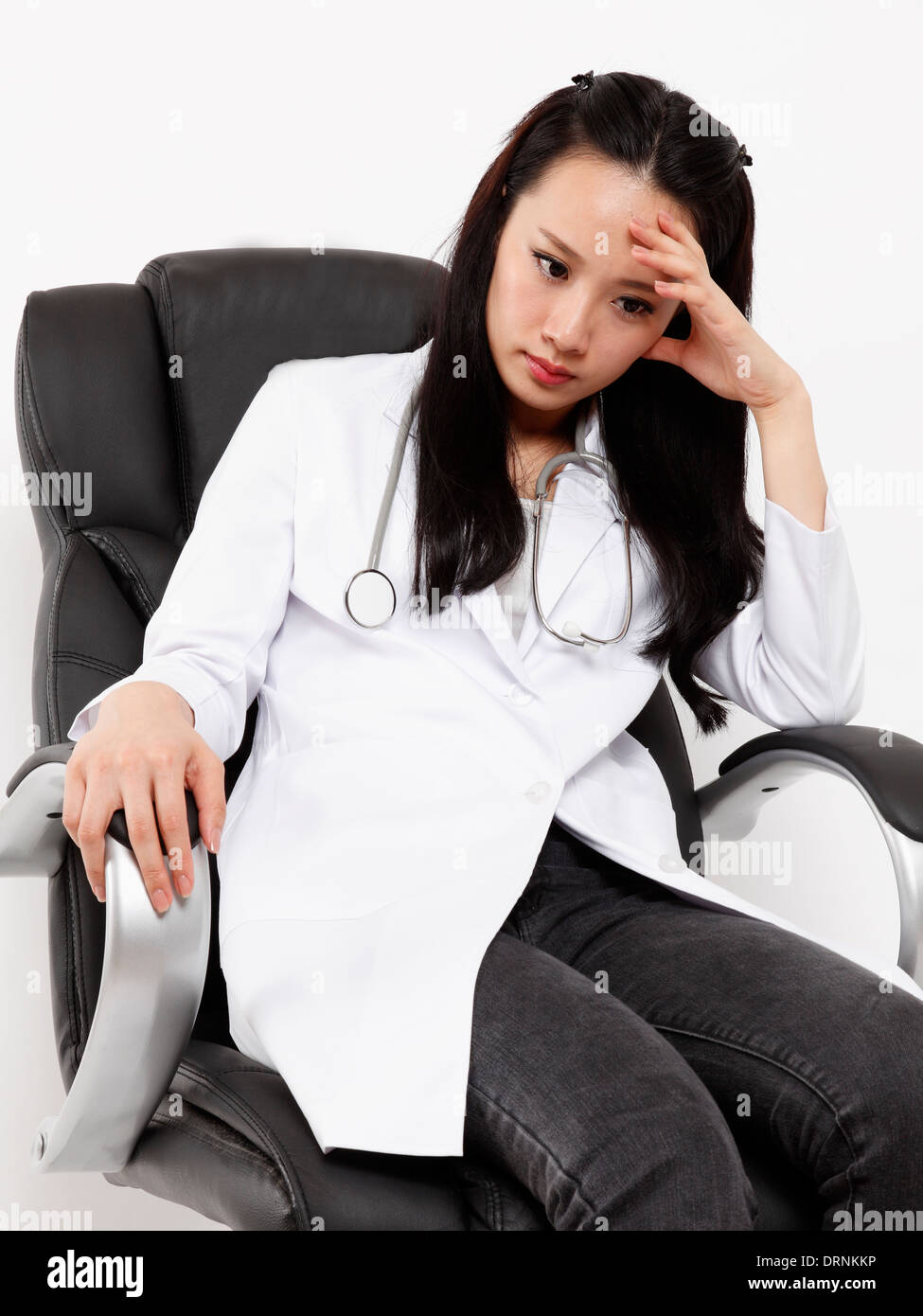 Female doctor is tired of working and having rest Stock Photo - Alamy