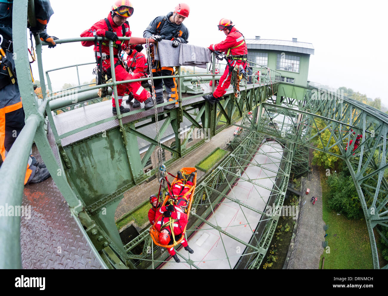 Local fire fighters have a high angle rescue exercise at the old ship canal lift Henrichenburg. Stock Photo