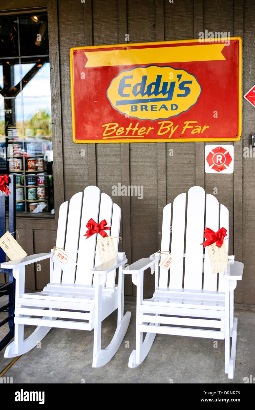 Old fashioned Quaker style Rocking Chairs for sale outside a store in