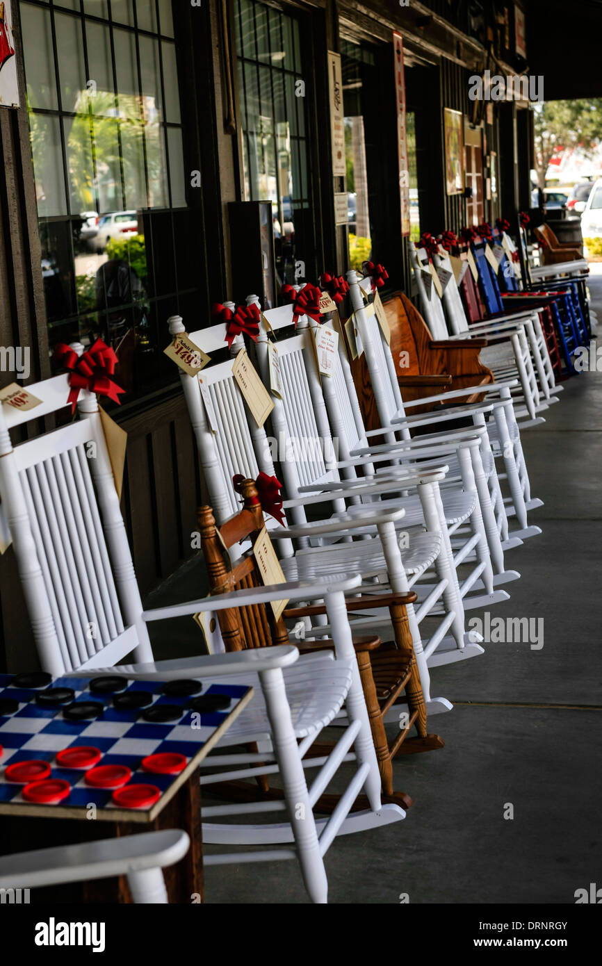 Old fashioned Quaker style Rocking Chairs for sale outside a store in Florida Stock Photo