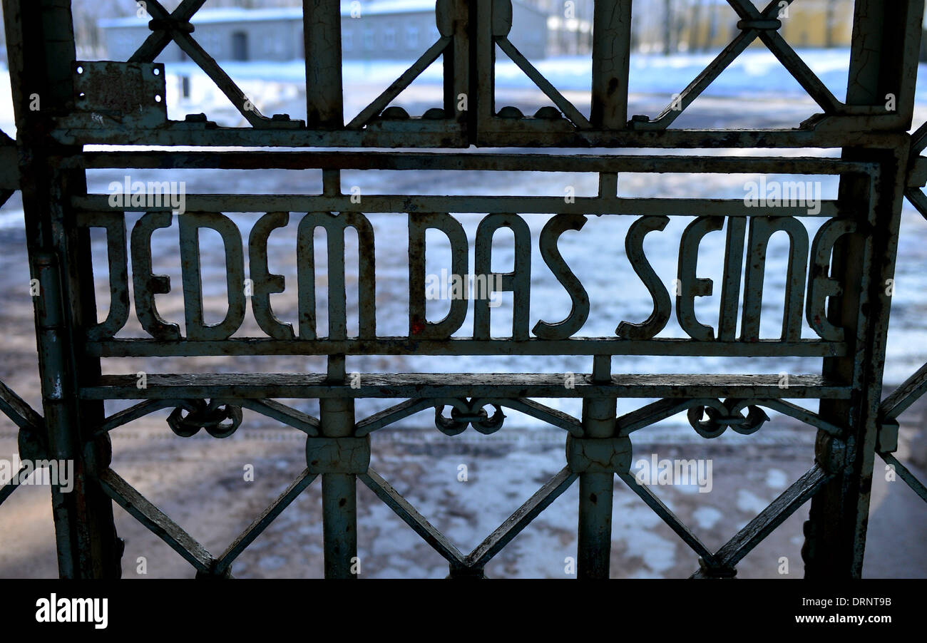 Weimar, Germany. 30th Jan, 2014. The gate to Buchenwald Concentration Camp reading 'Jedem das Seine' (to each what he deserves) near Weimar, Germany, 30 January 2014. The Buchenwald and Mittlebau-Dora foundation is having the gate restored. A replica will be installed until the restoration work is completed on the gate which was designed by Bauhaus student and concentration camp prisoner Franz Ehrlich. Photo: MARTIN SCHUTT/dpa/Alamy Live News Stock Photo
