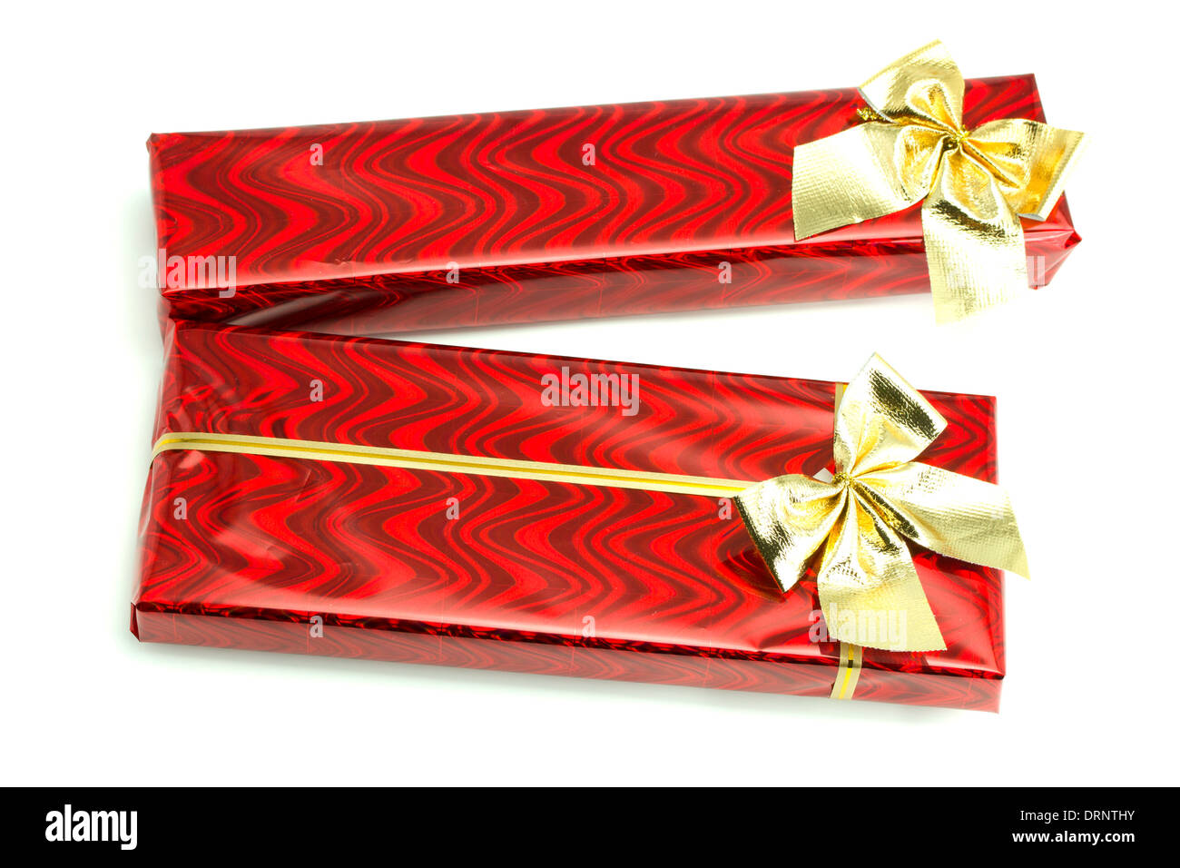 Red gifts with gold bows on the white isolated background Stock Photo ...