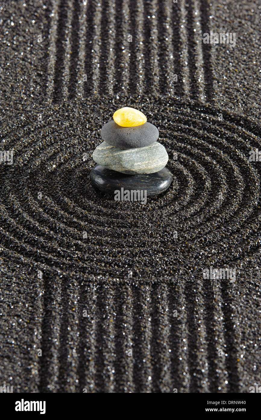 Japanese ZEN garden with stone in black sand Stock Photo - Alamy, image size:866x1390