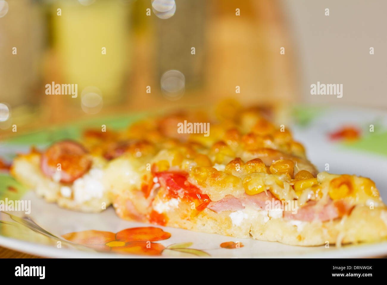 Supreme Pizza slice with vegetables and salami toping Stock Photo
