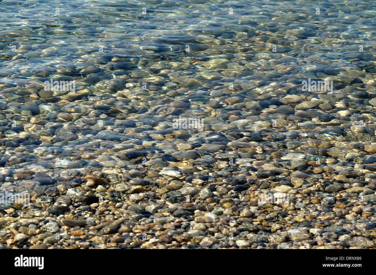 pebbles in water Stock Photo Alamy