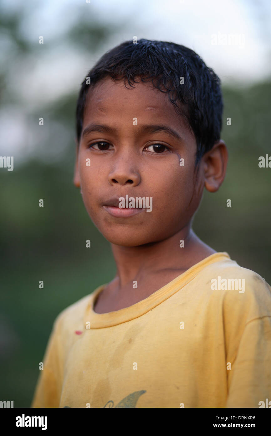 Portrait of Indonesian boy looking at the camera. Sumba Island ...